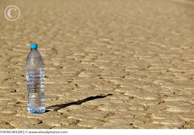 africa_namibia_namib_desert_water_bottle_on_dry_fof002404